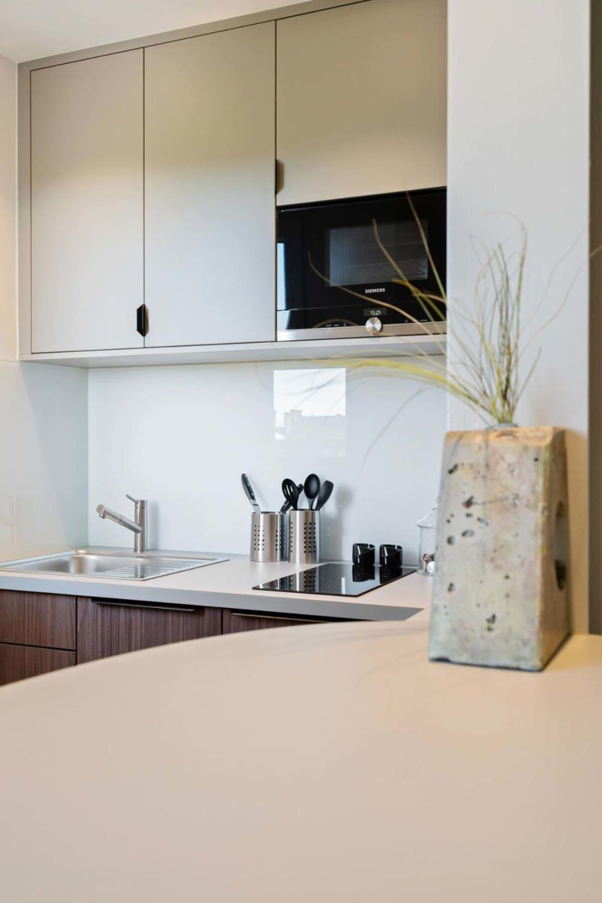 Appartement Sleek And Chic Studio In The Heart Of City